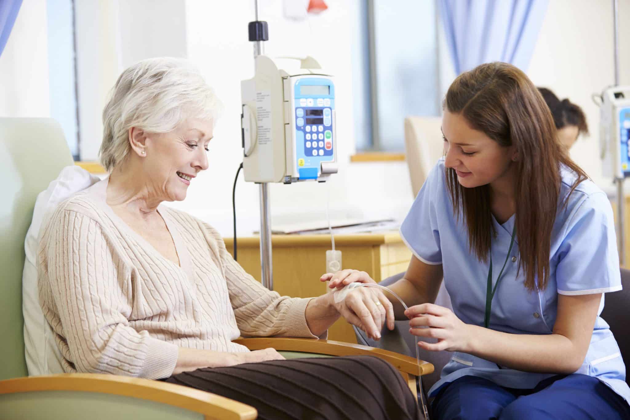 Doctor administering IV on a senior woman patient – Understanding What Is Vitamin IV Therapy?